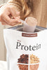 Proteína de chocolate dōTERRA, proporciona un suplemento proteico delicioso y nutritivo.